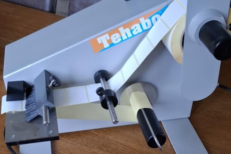 Gespot: Etiketdispenser